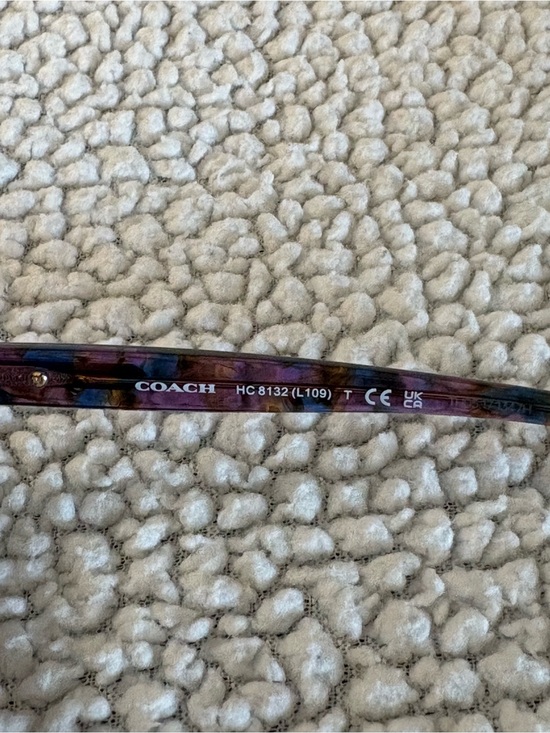 Coach Black Embossed Hard Sunglasses Case and Purple Confetti Sunglasses.